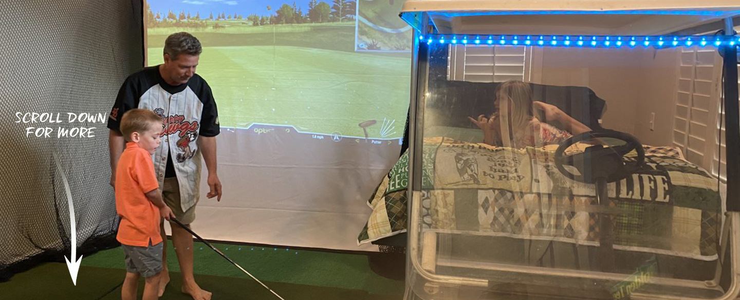 golf simulator in bedroom with bed made out of a golf cart