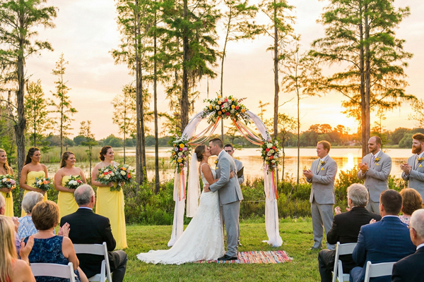 weddings by a lake at a big airbnb near orlando florida in the yard