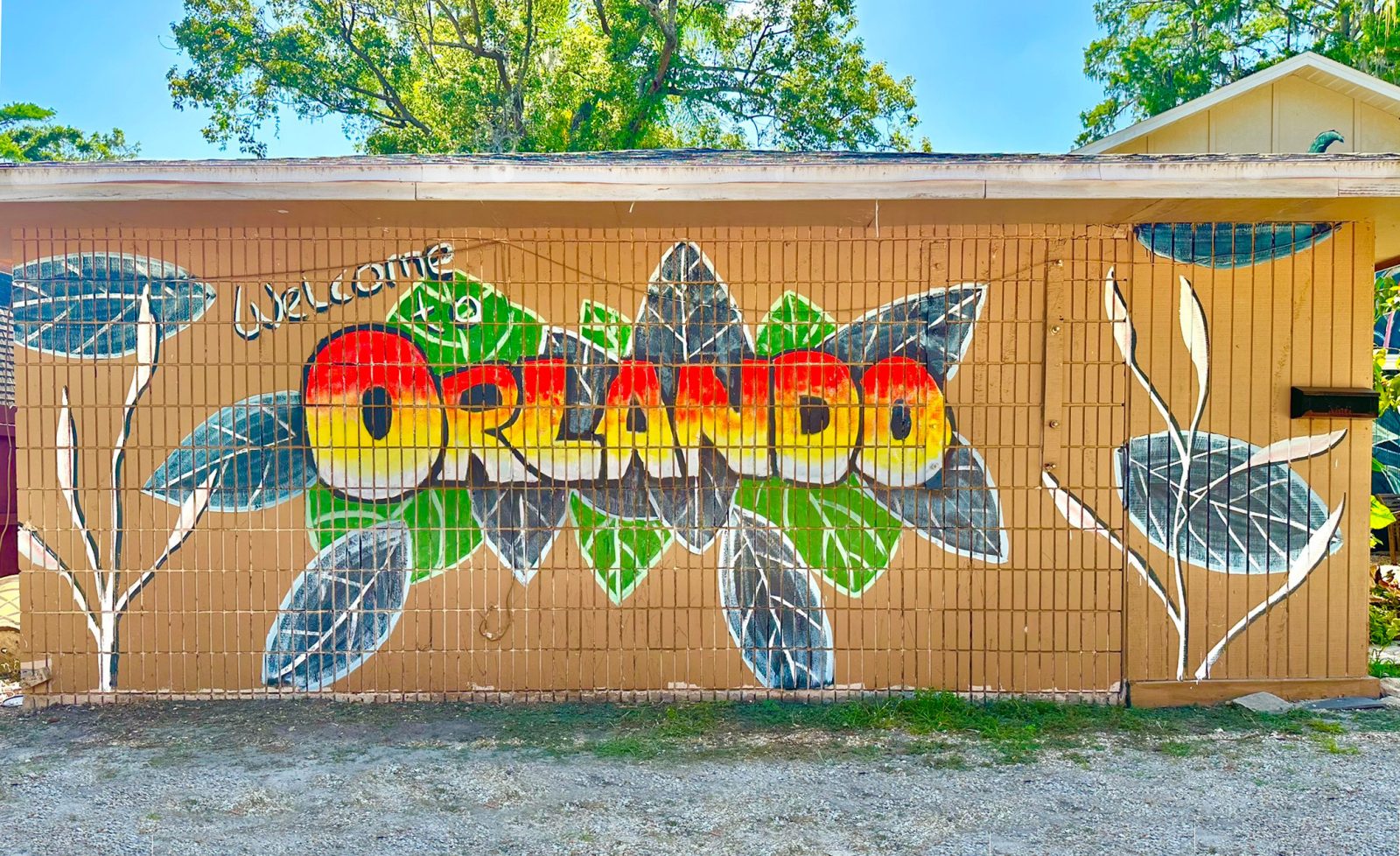 Colorful Welcome to Orlando mural on an exterior wall