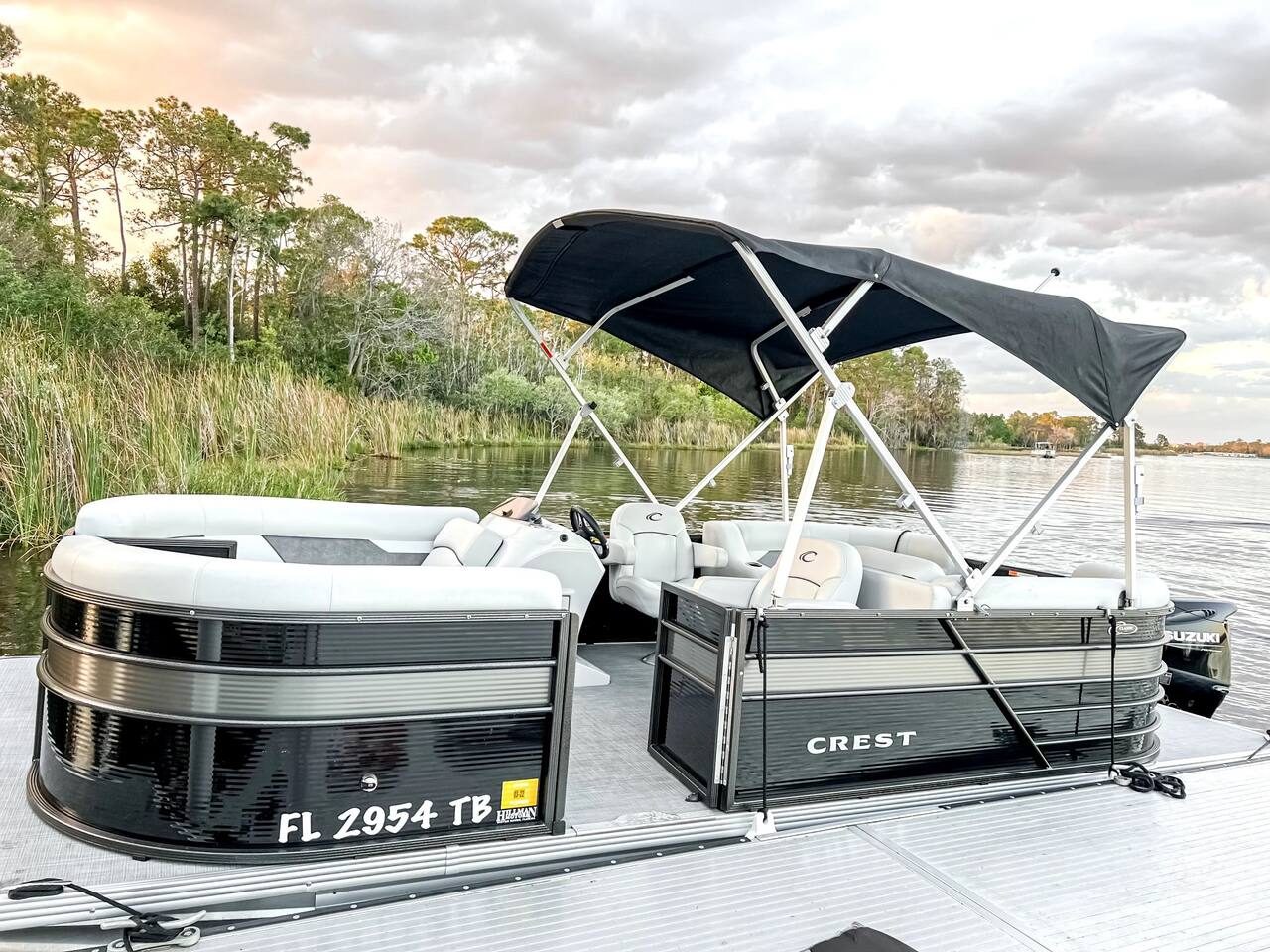 Cruise the lake in style aboard a private pontoon boat.