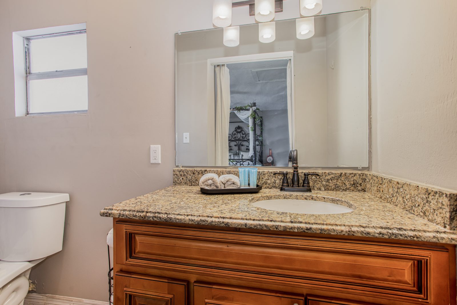 Freshen up at a granite vanity with spa-soft towels.