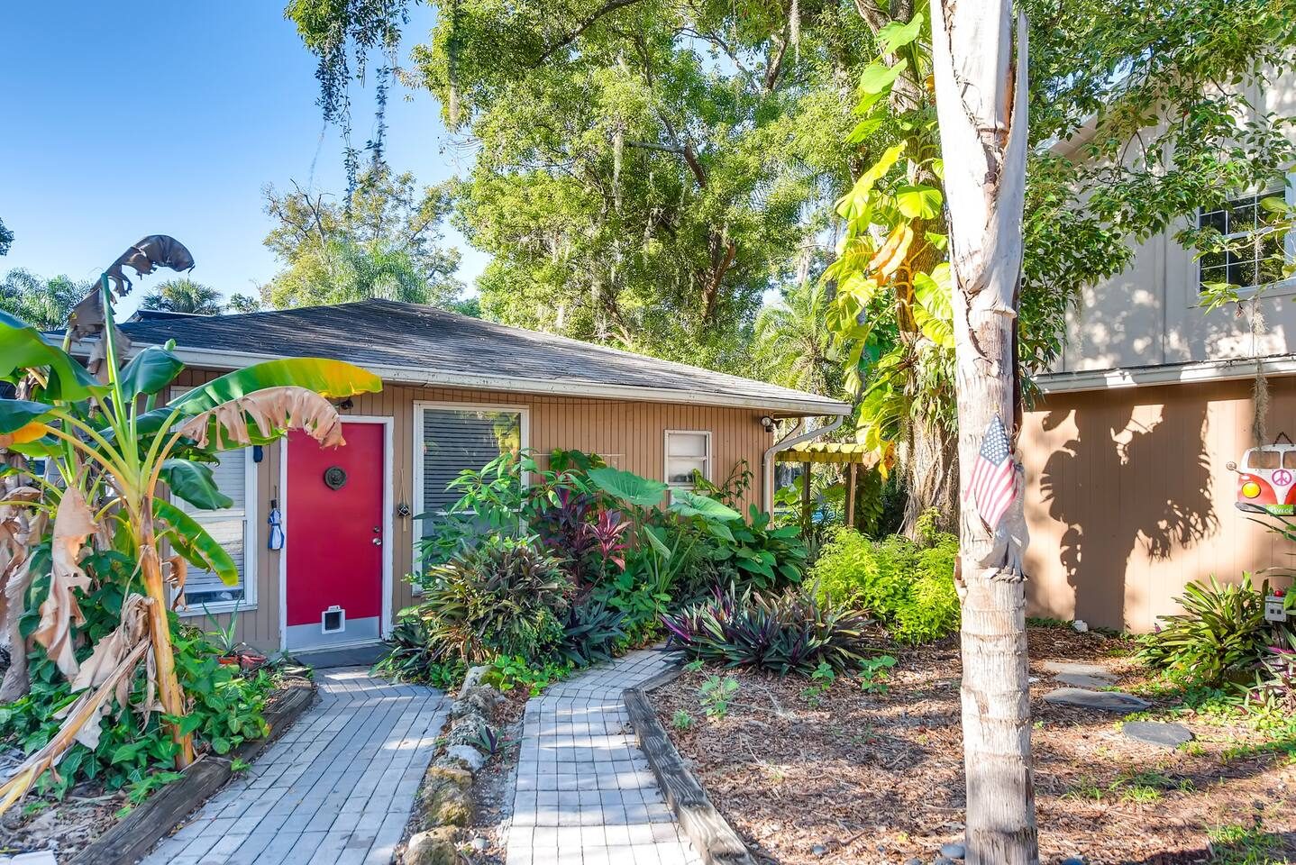 Slip through your own red door into a tropical hideaway.
