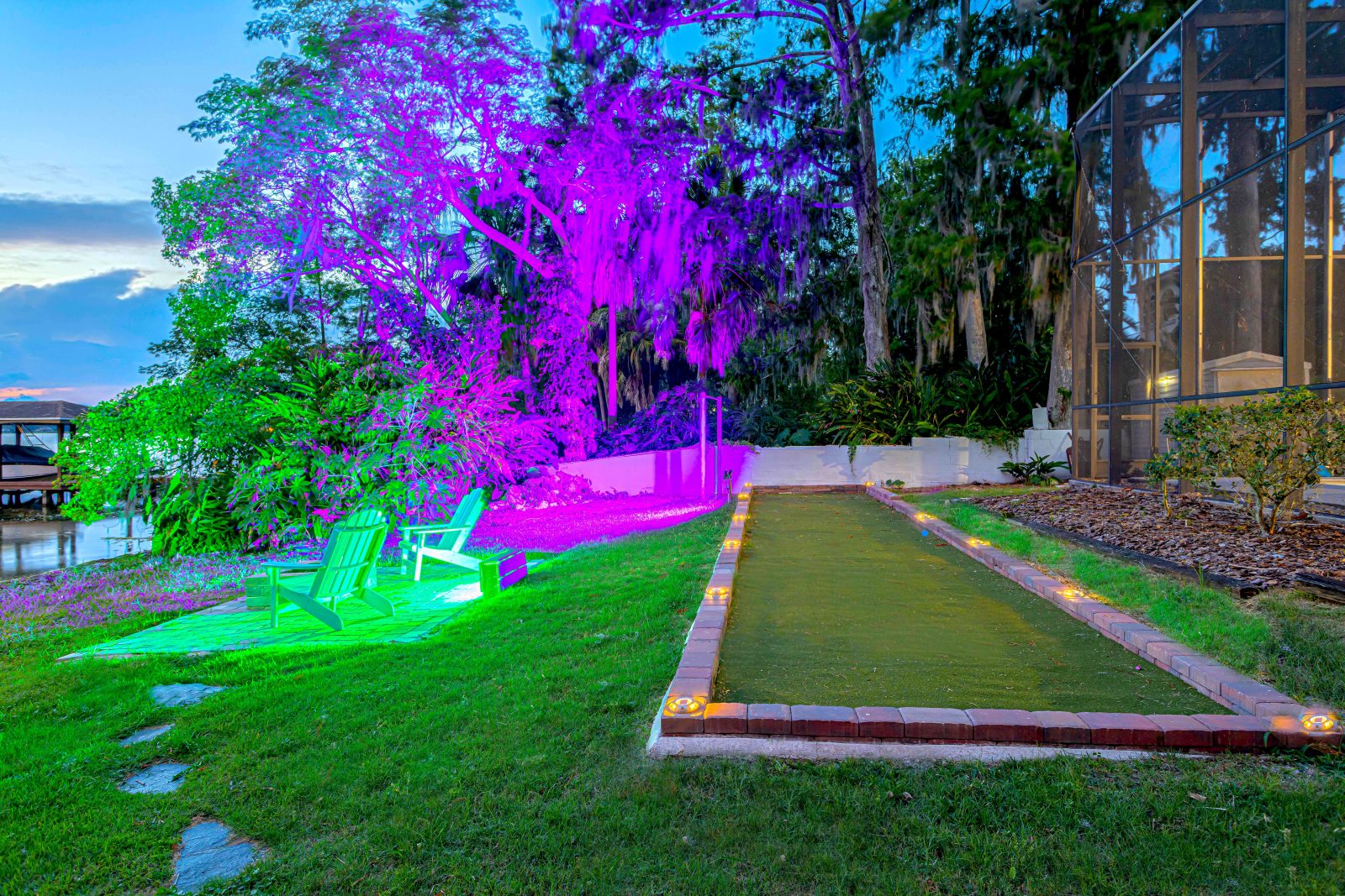 Roll a game of bocce as the sun dips behind the palms.