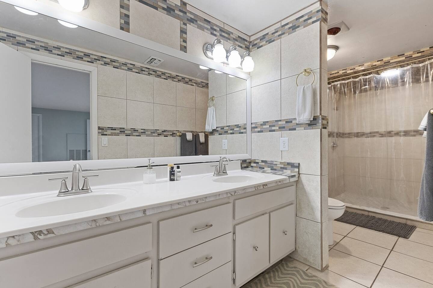 Get ready for the day at the double-sink master vanity.