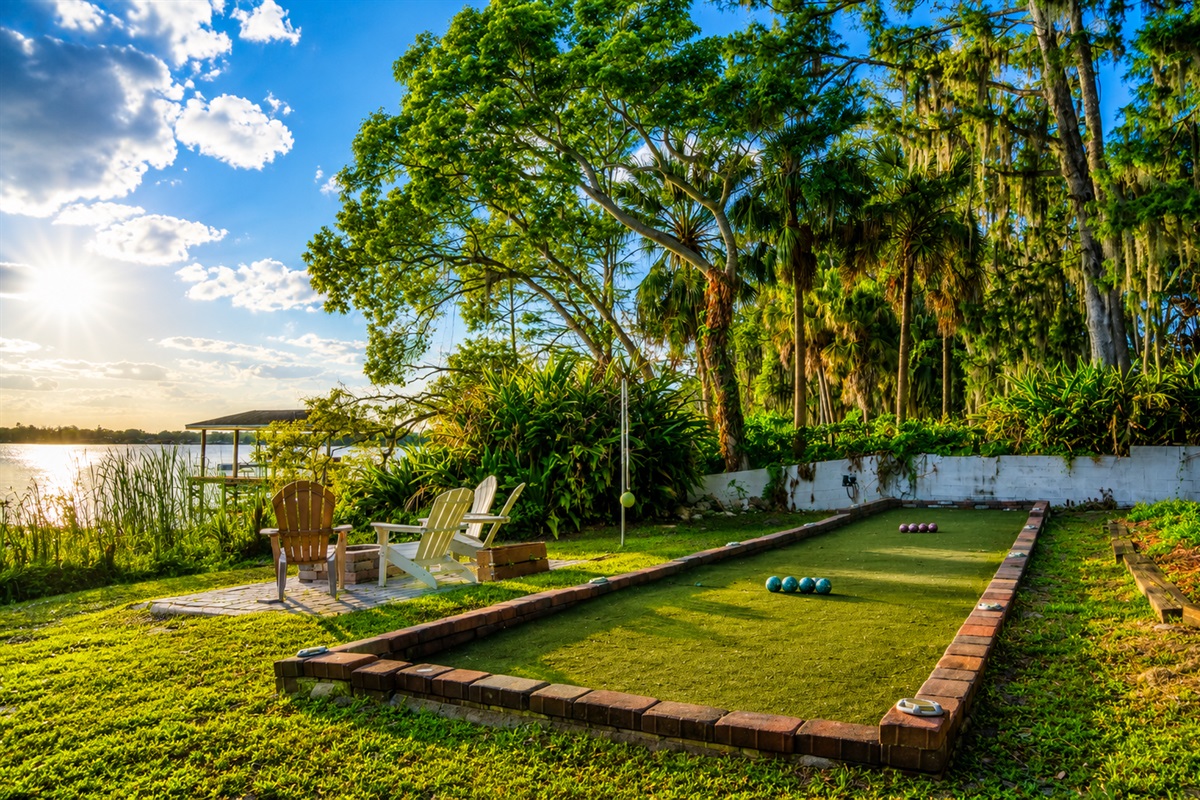 Roll a game of bocce as the sun dips behind the palms.