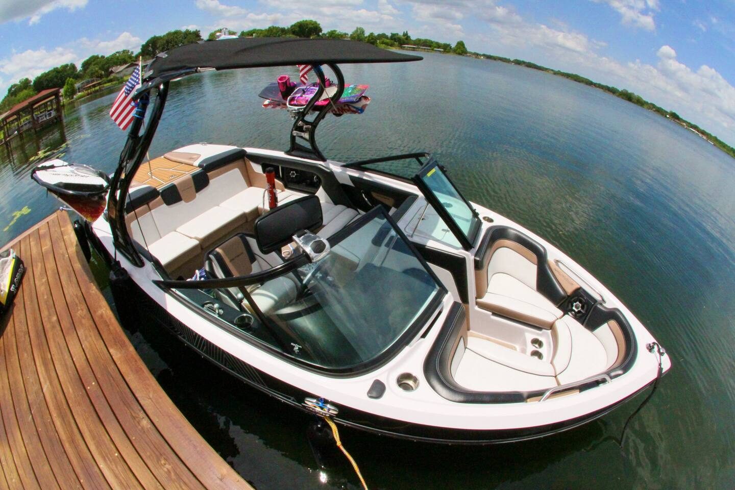 Carve the wake on a sunny lake day