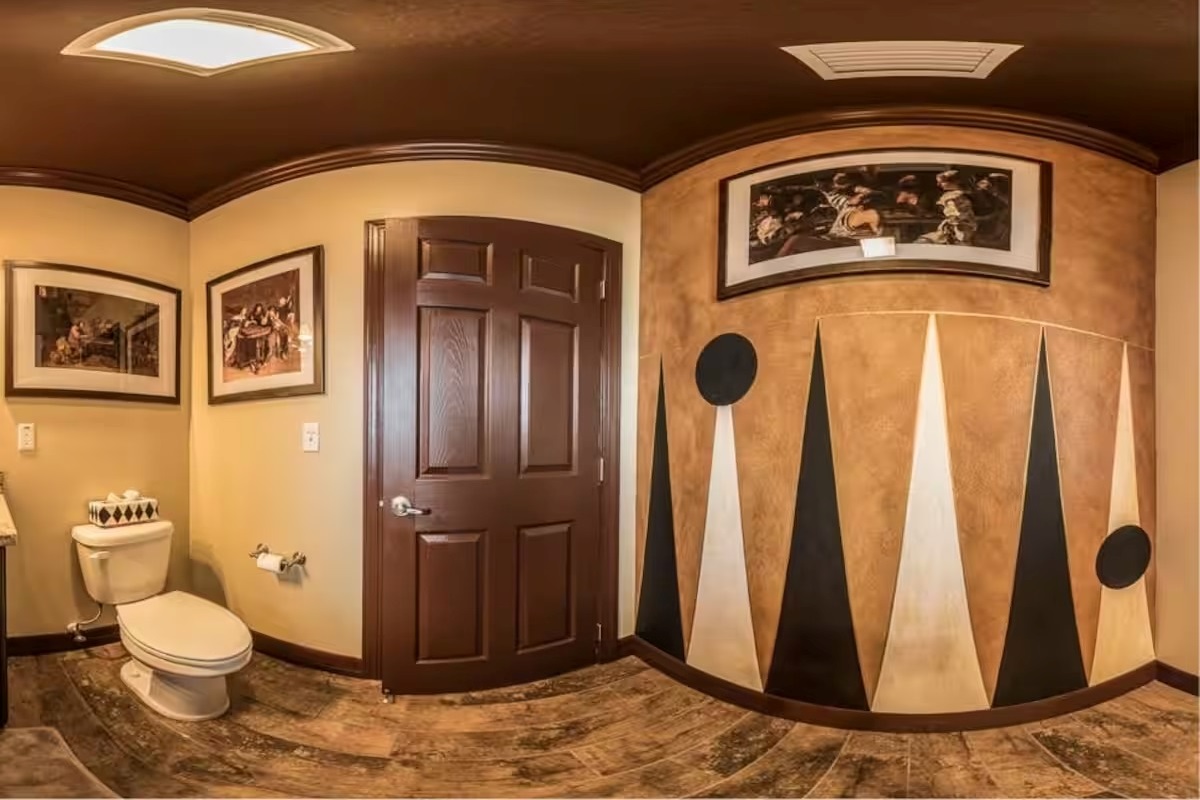 A hallway with a backgammon-pattern floor.