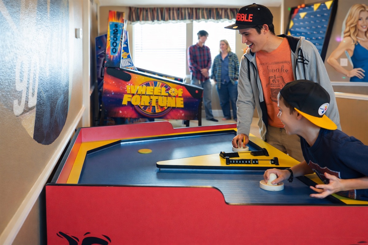 Tabletop shuffleboard in the video game arcade.