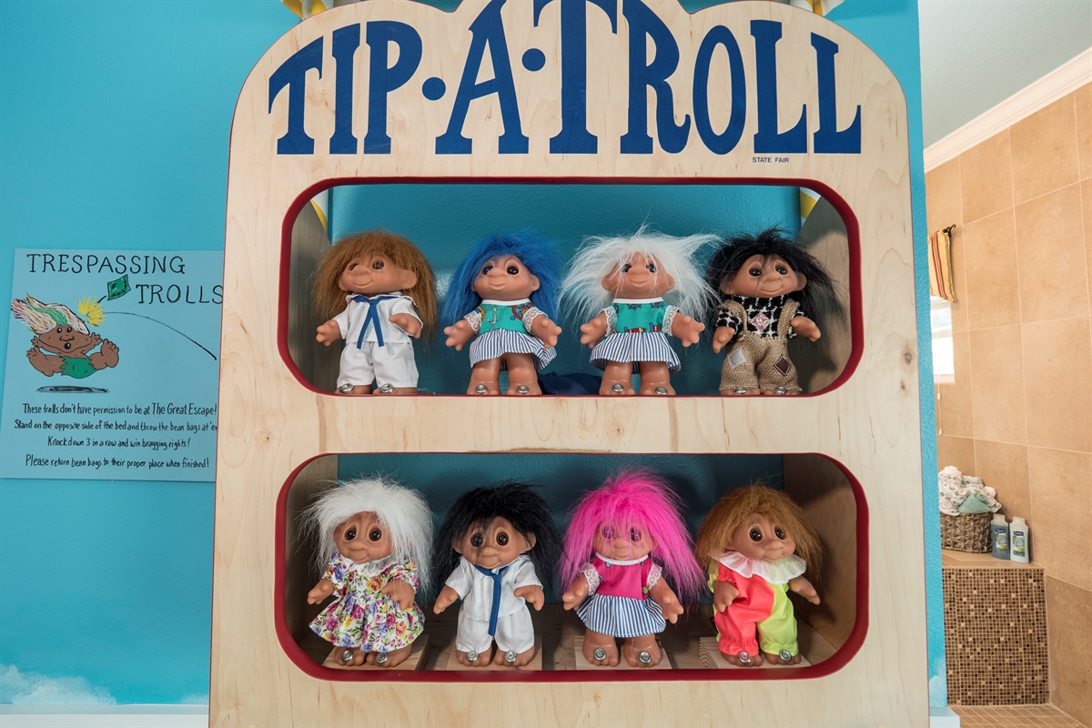 A troll toy machine in the arcade.