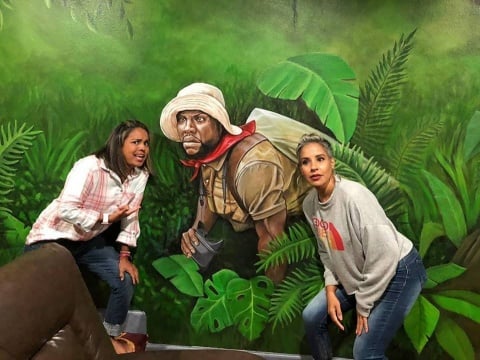 Jungle characters painted floor to ceiling.