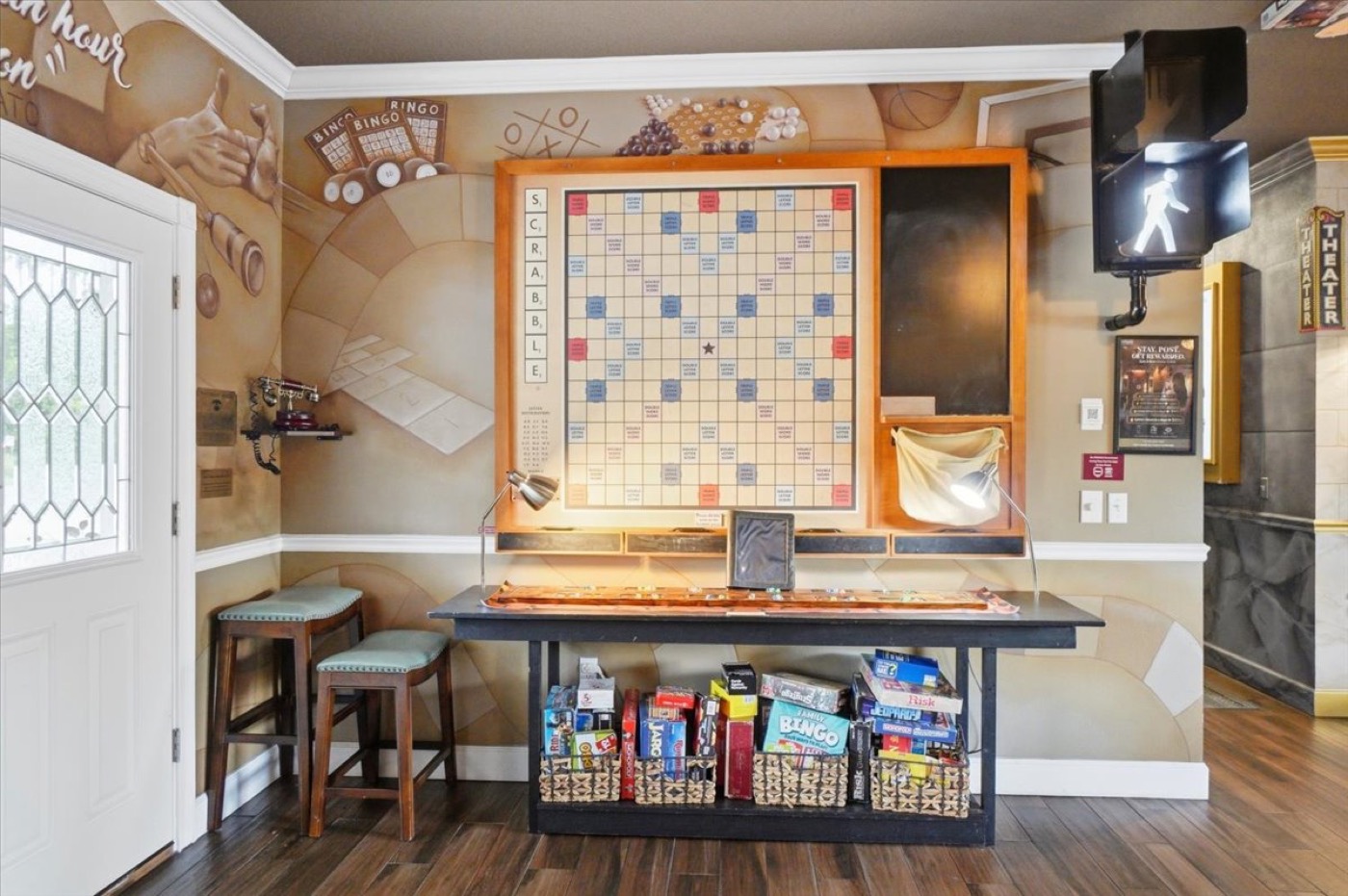 The 6 foot Scrabble wall greets you at the door.