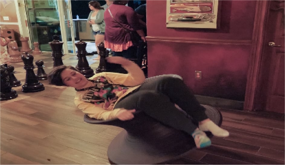 Twirling in the spun chair.
