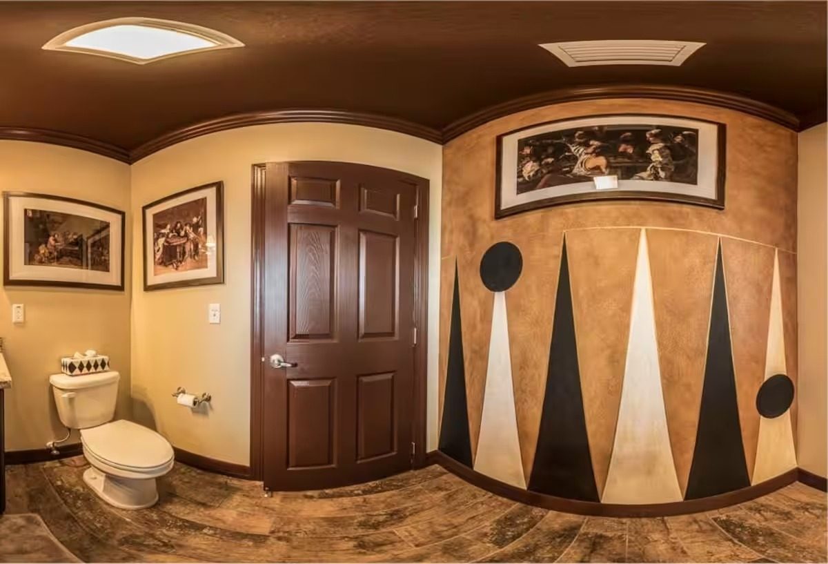A hallway with a backgammon-pattern floor.